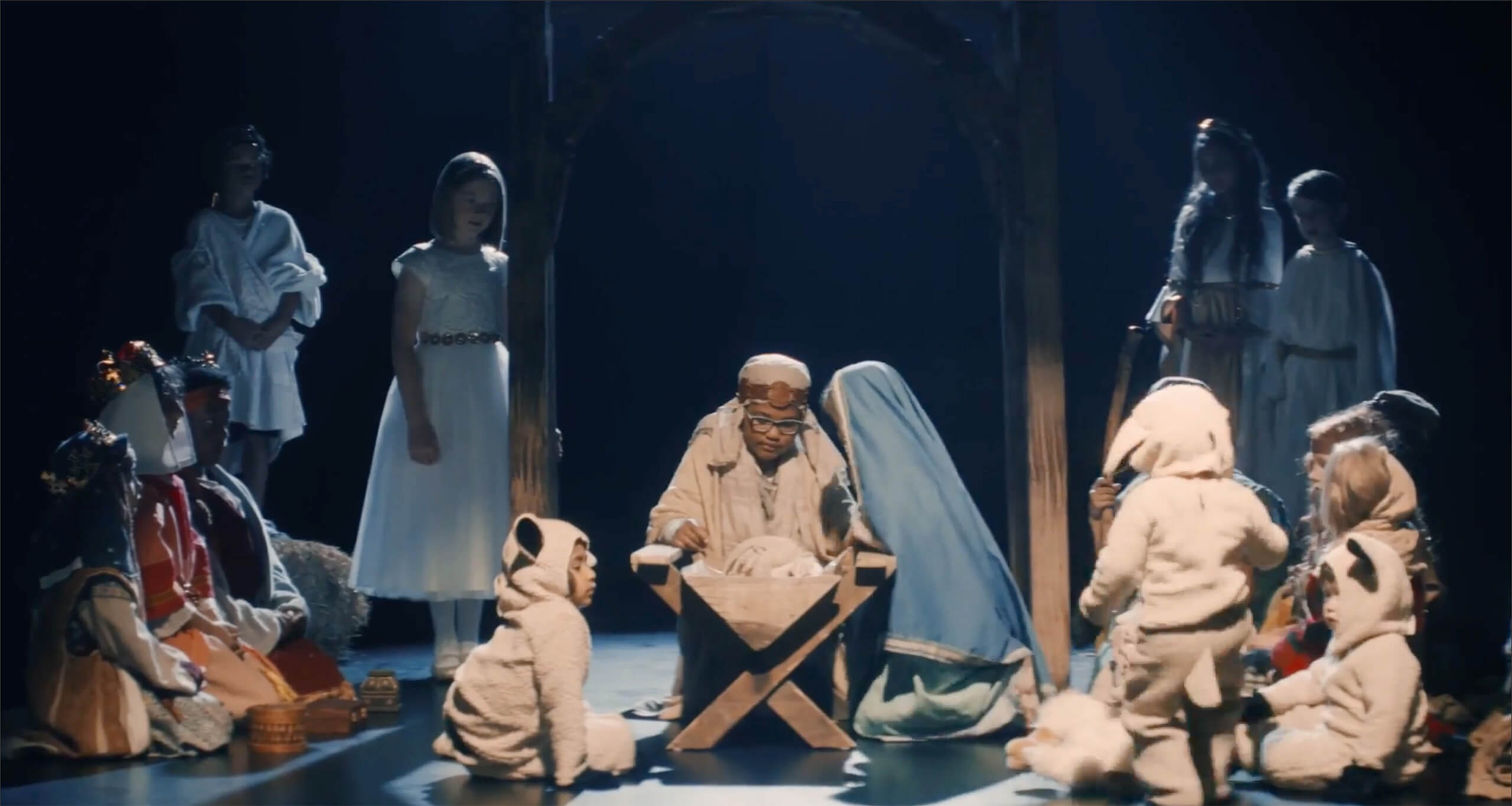 A group of children performing a Nativity play.