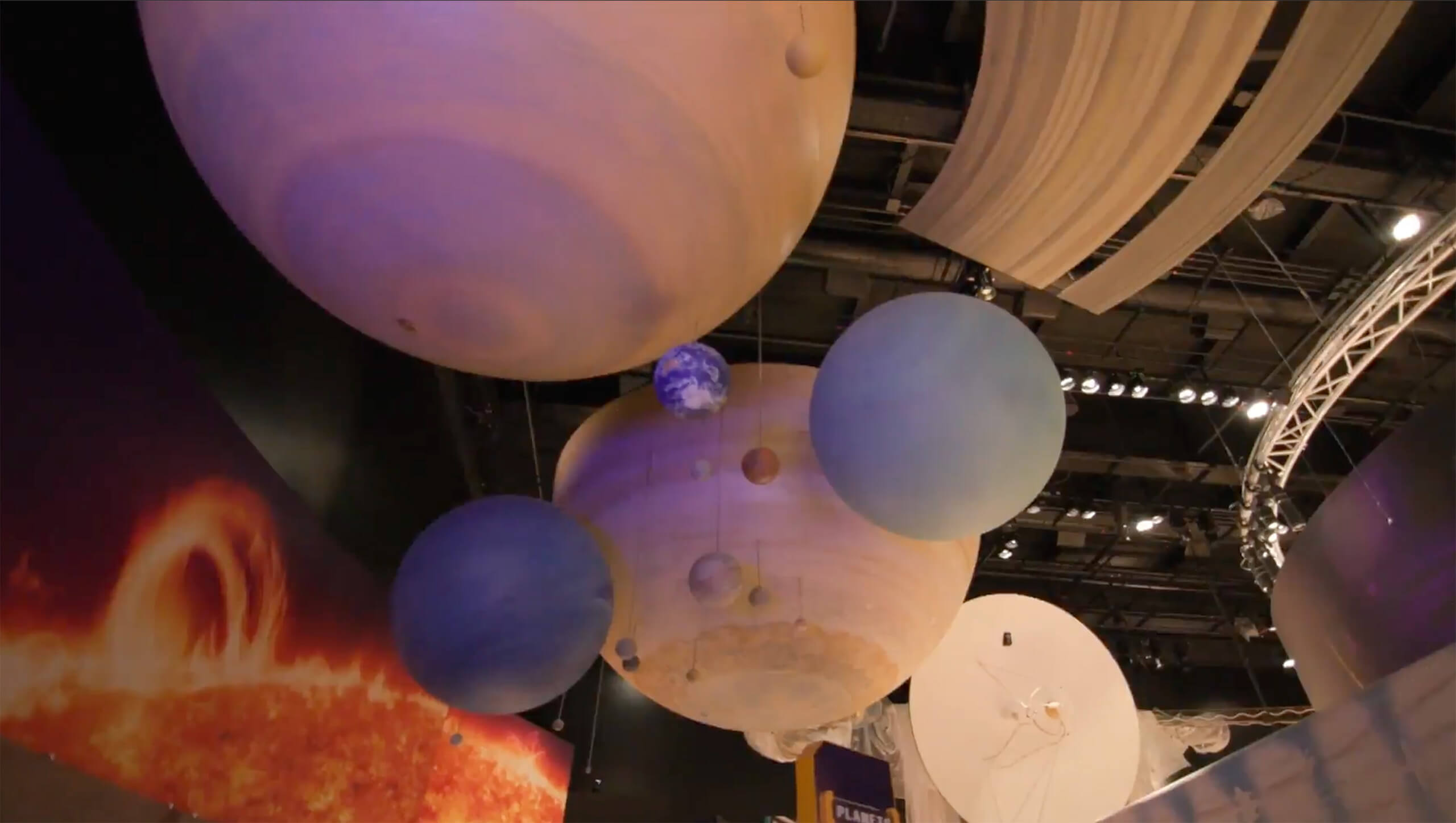 An image of the planets hanging from the ceiling at the Smithsonian Air & Space museum.