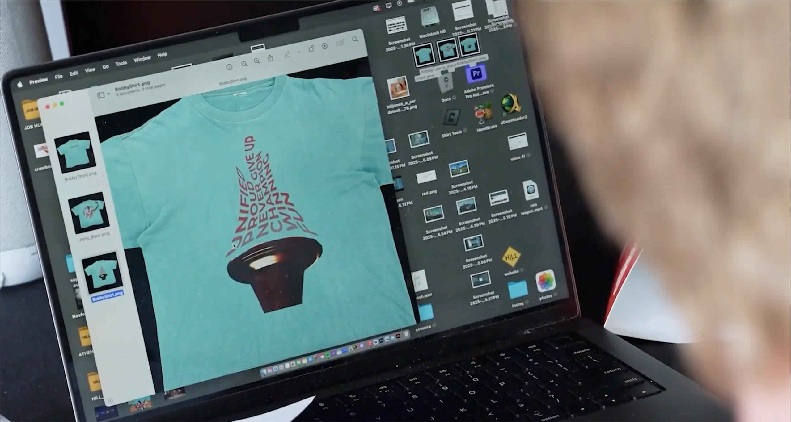An image showing a digital shirt design on a laptop.